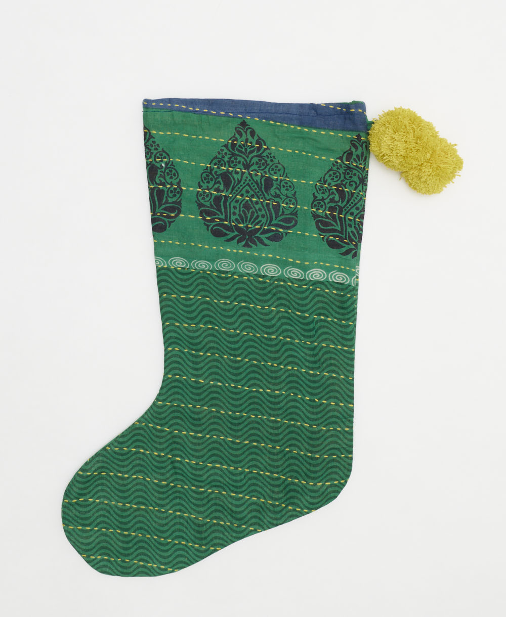 unique holiday stocking handmade from vintage cotton saris in India featuring kelly green & black wavy print