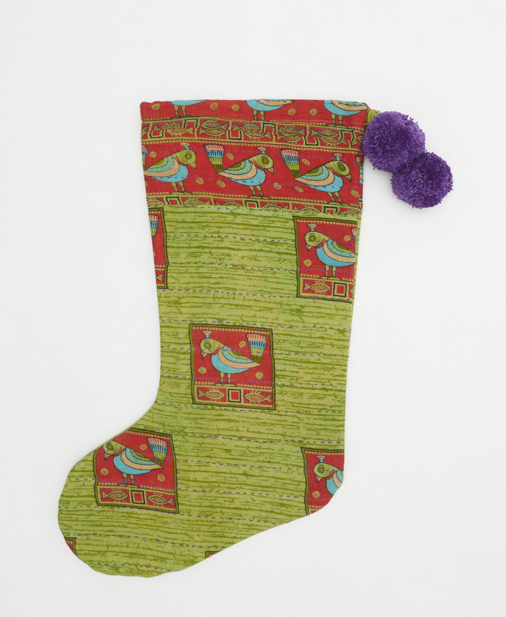 pear green holiday stocking in novelty parrot print with purple pom poms