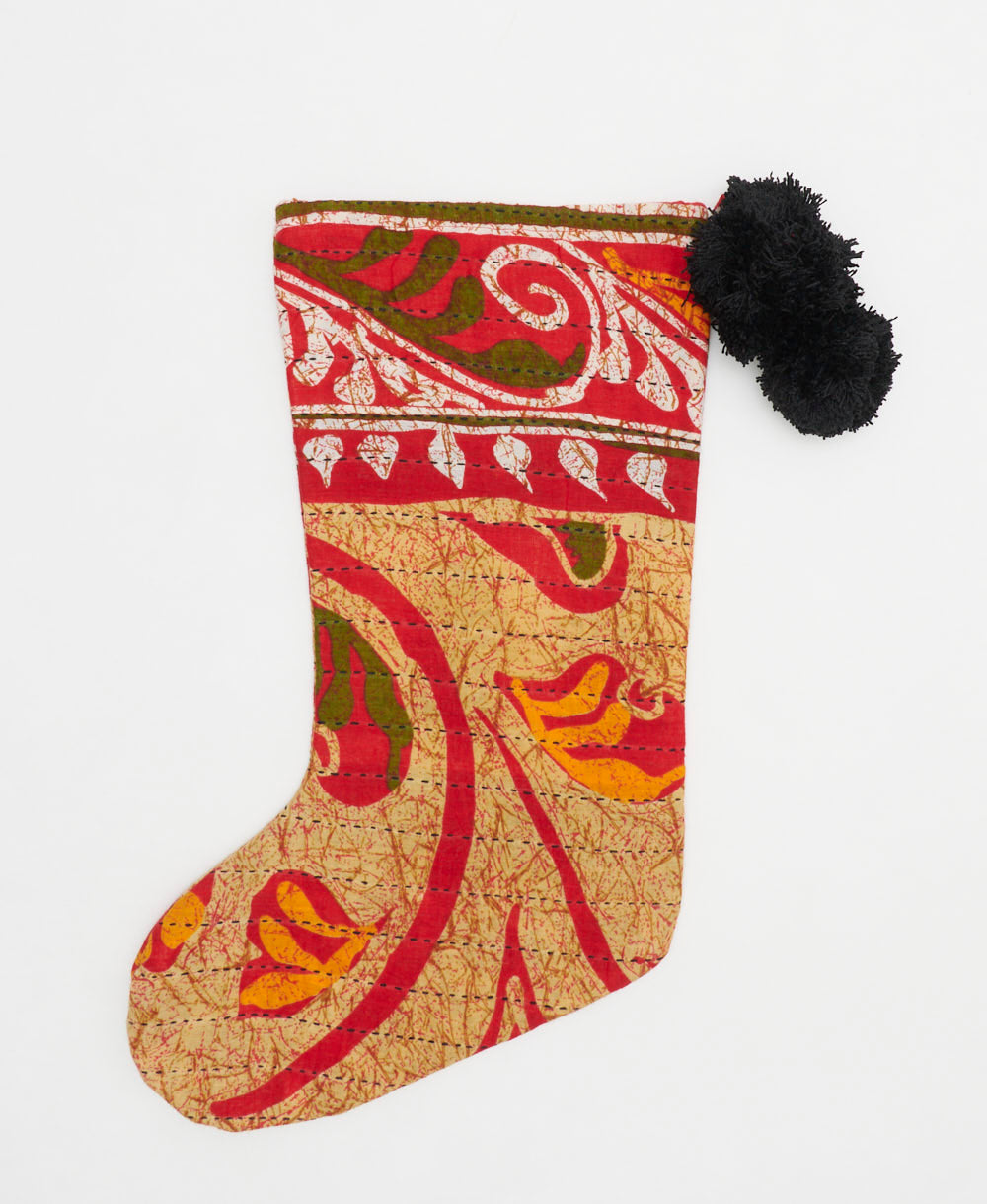 unique holiday stocking made from upcycled vintage cotton saris in India in red and tan swirling floral print