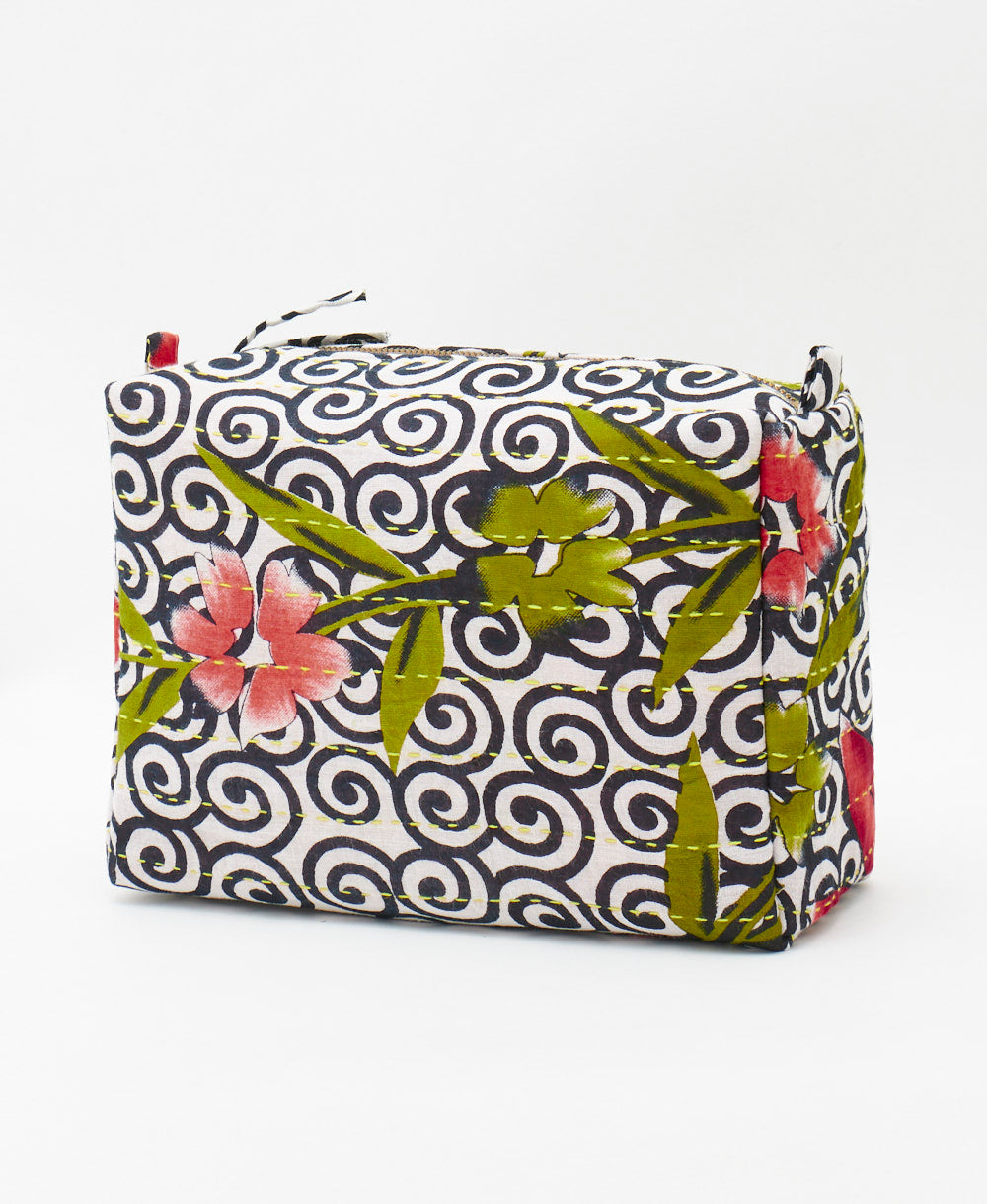 artisan made large cosmetic bag featuring a graphic floral print 