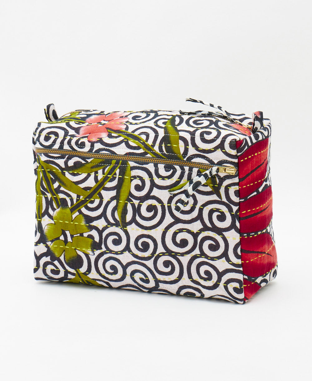 one-of-a-kind artisan made large toiletry bag featuring a black and white swirl print 