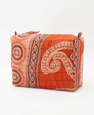 large cosmetic bag featuring sustianably made using upcycled coral vintage cotton saris 