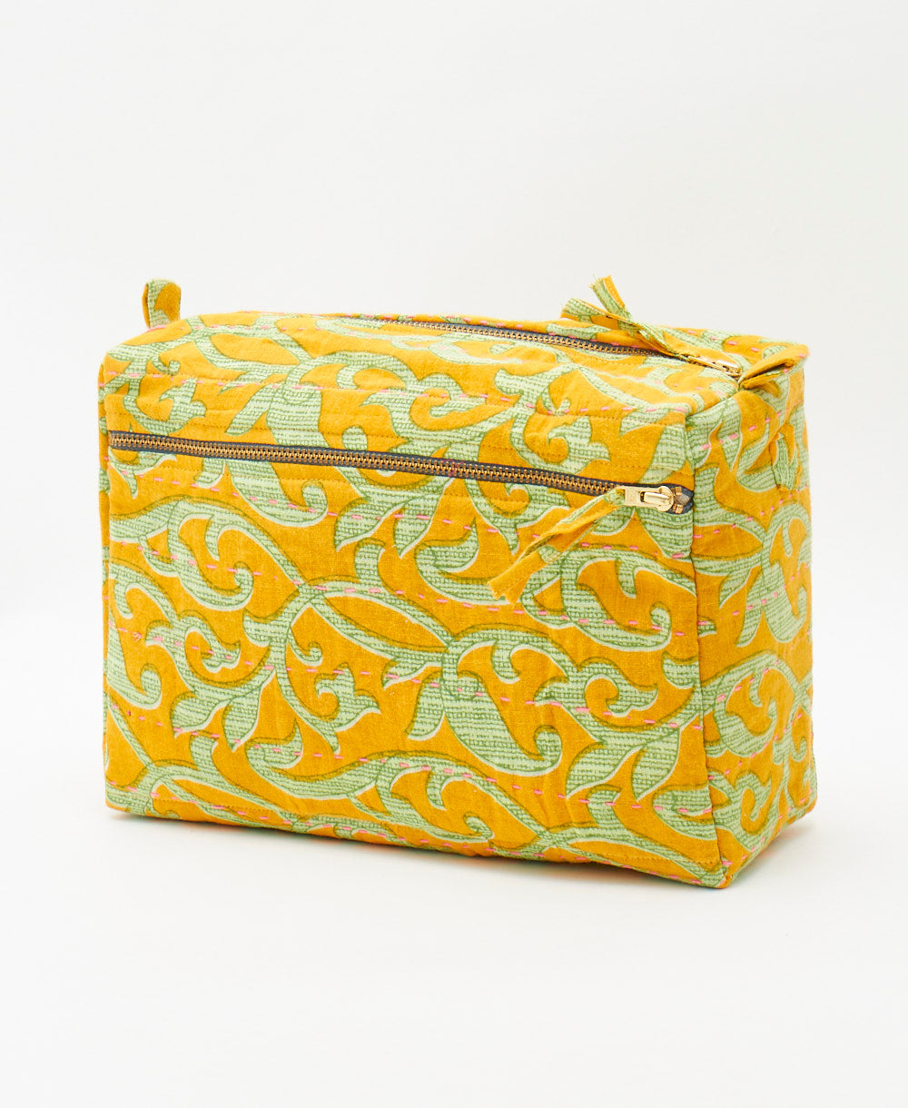 amber yellow large toiletry bag featuring a green vine print and pink traditional kantha hand stitching 