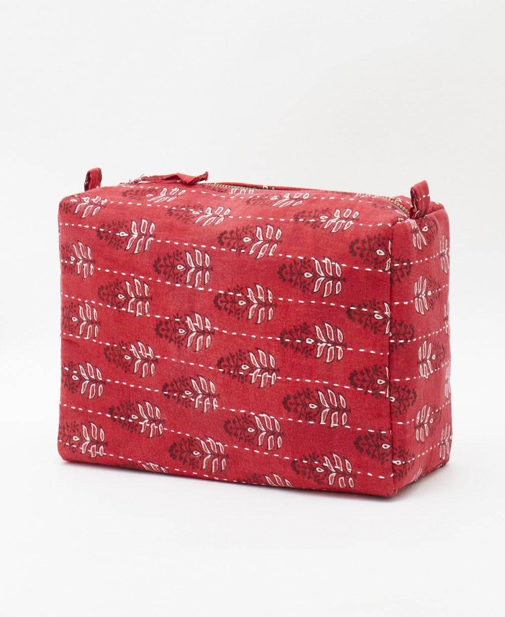 one-of-a-kind large cosmetic bag handmade by women featuring white traditional kantha hand stitching 