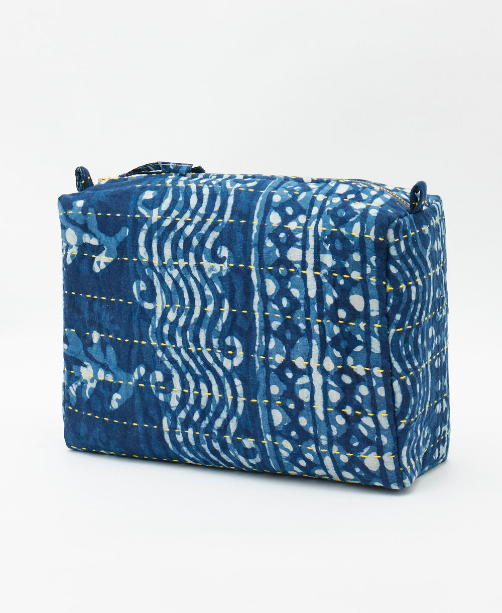 large cosmetic bag in a one of a kind blue wavy print featuring traditional kantha hand stitching 