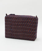 eco-friendly large cosmetic bag in navy blue & tiny red floral print made in India by women artisans 