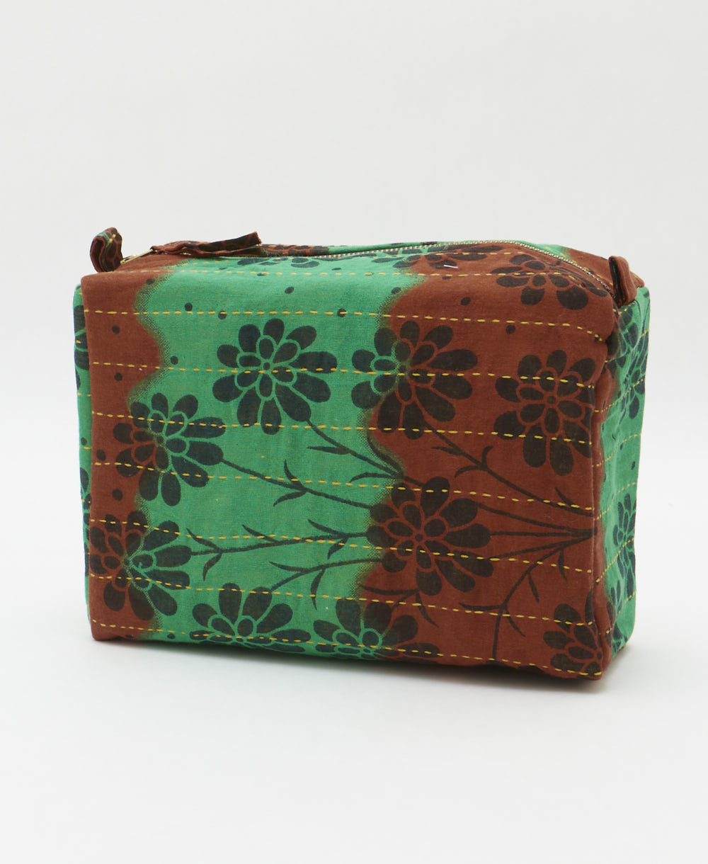 eco-friendly large cosmetic bag in rust red and green daisy print made in India by women artisans 