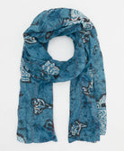 ocean blue cotton scarf in long silhouette with abstract pattern