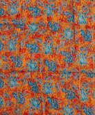 artisan made cotton scarf in bright orange with cerulean blue flowers by Anchal