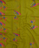 handmade cotton scarf in avocado green with colorful novelty bird pattern