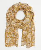 lightweight cotton scarf in a mustard yellow and ivory floral print with hand-stitched embroidery