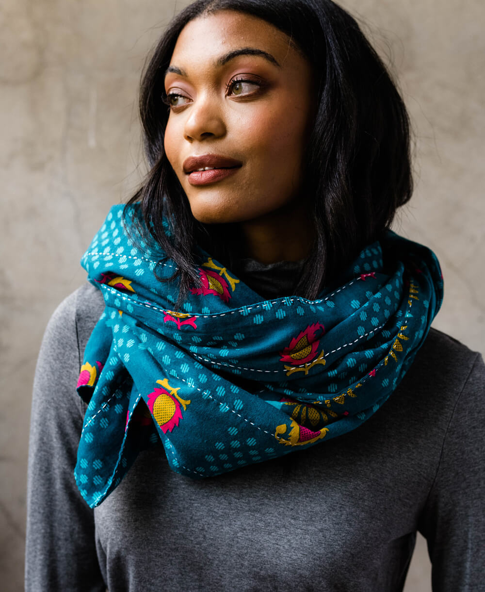 cozy long scarf in a bold and bright blue hue with embroidered hand-stitching made from vintage cotton