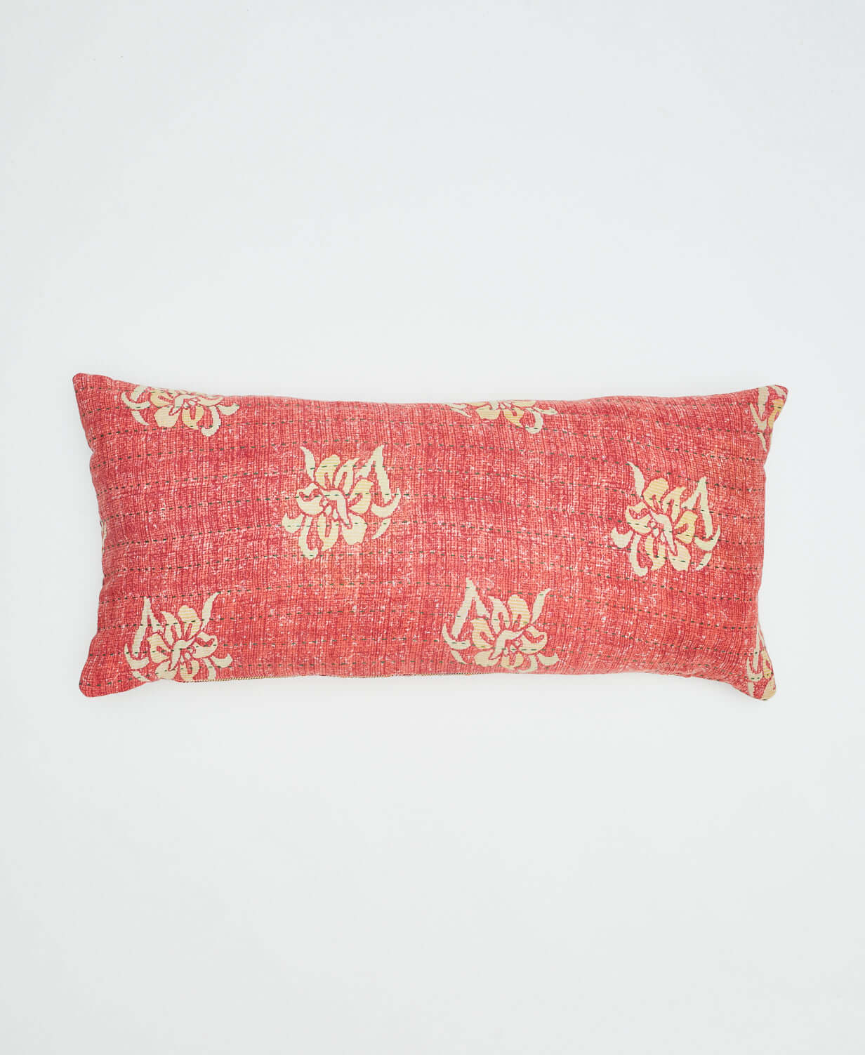 coral pink lumbar throw pillow with white Hawaiian flower print handmade in India from upcycled saris