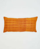 tangerine orange lumbar pillow with red graphic stripes