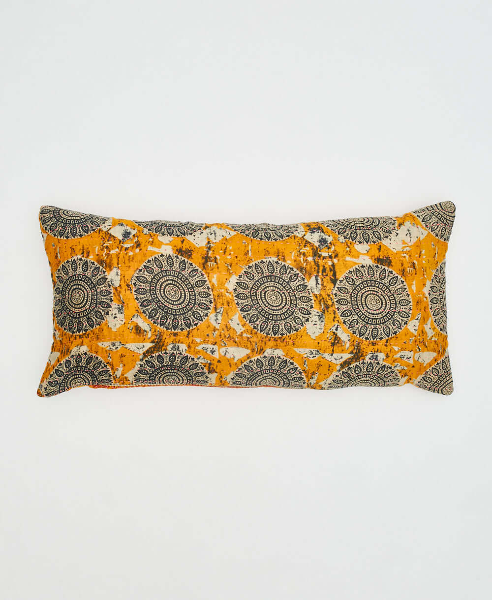 lumbar pillow in tangerine orange with black & white medallion print handmade by women artisans