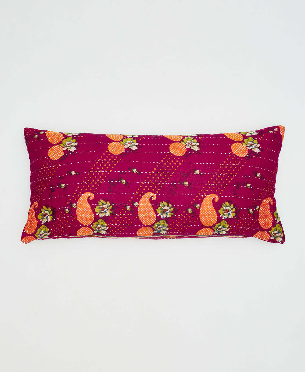 ethically made lumbar pillow with hot pink reversible sides for 2 pillows in 1