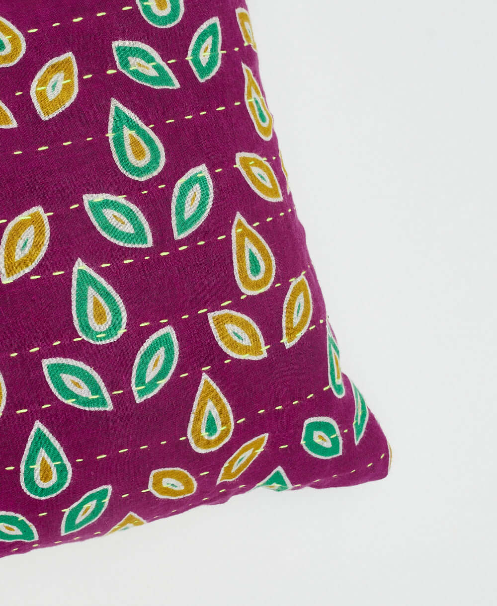 warm purple cotton lumbar throw pillow with hand-embroidered kantha straight stitching