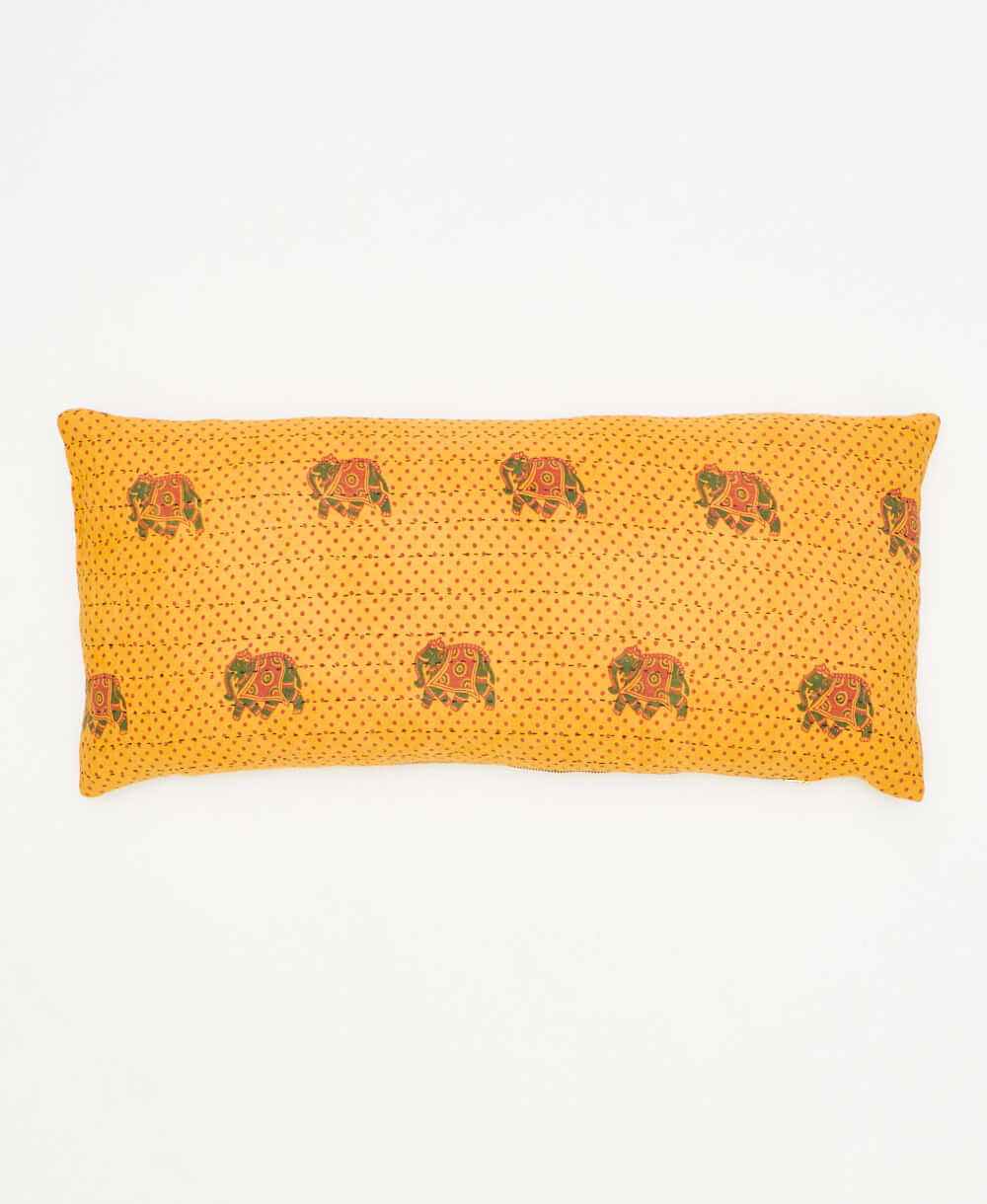 lumbar pillow featuring traditional hand stitching and an elephant print 