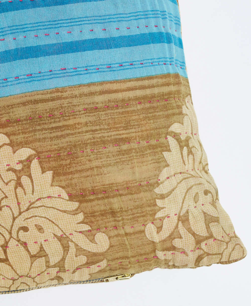 sustainable lumbar pillow in light brown teal stripe print with pink kantha embroidery