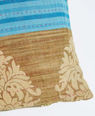 sustainable lumbar pillow in light brown teal stripe print with pink kantha embroidery