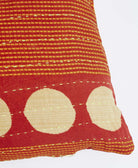 sustainable lumbar pillow in red & tan polka dot print with green kantha embroidery