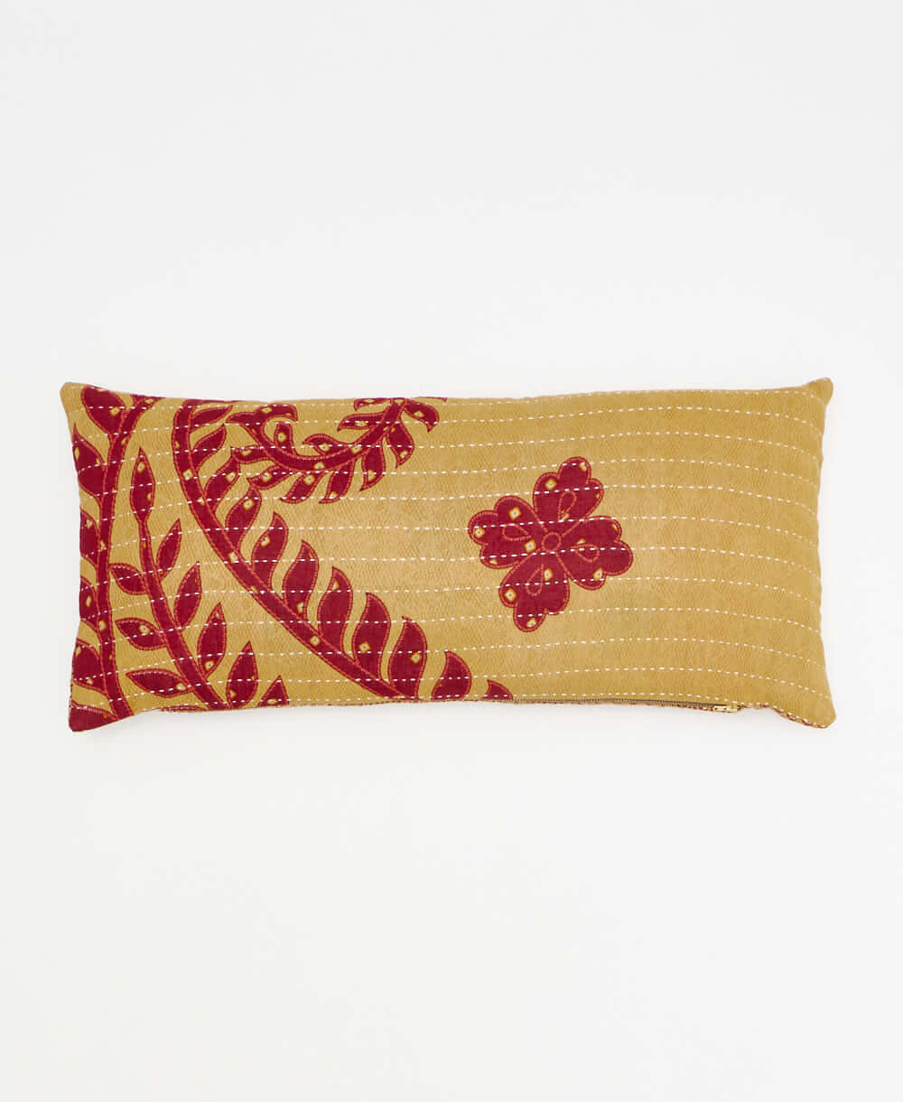 yellow-tan lumbar pillow with red vine print made from upcycled vintage cotton saris in India