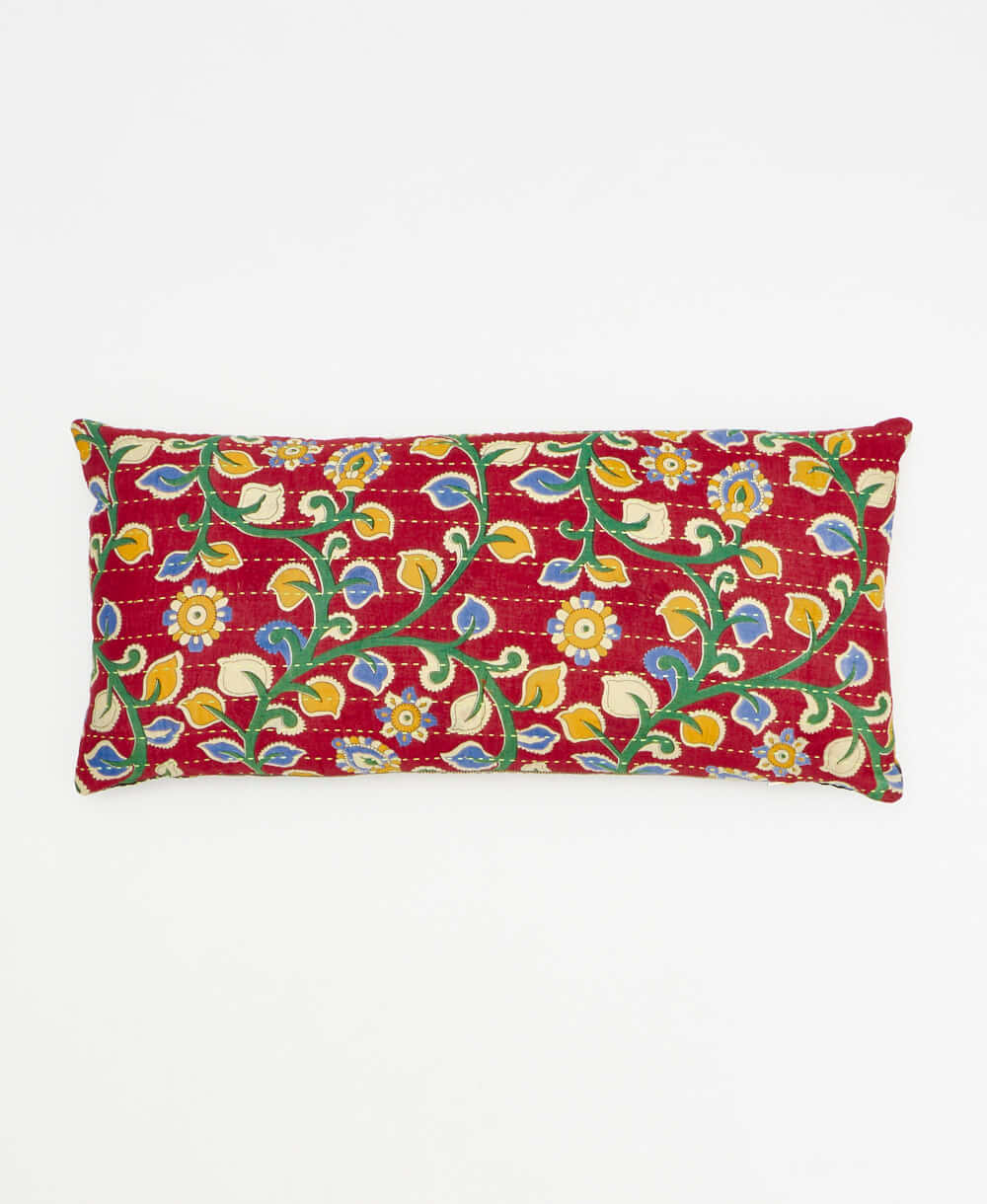 cherry red lumbar pillow with green & yellow vine print made from upcycled vintage cotton saris in India