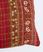 sustainable lumbar pillow in crimson red & white paisley print with neon green embroidery