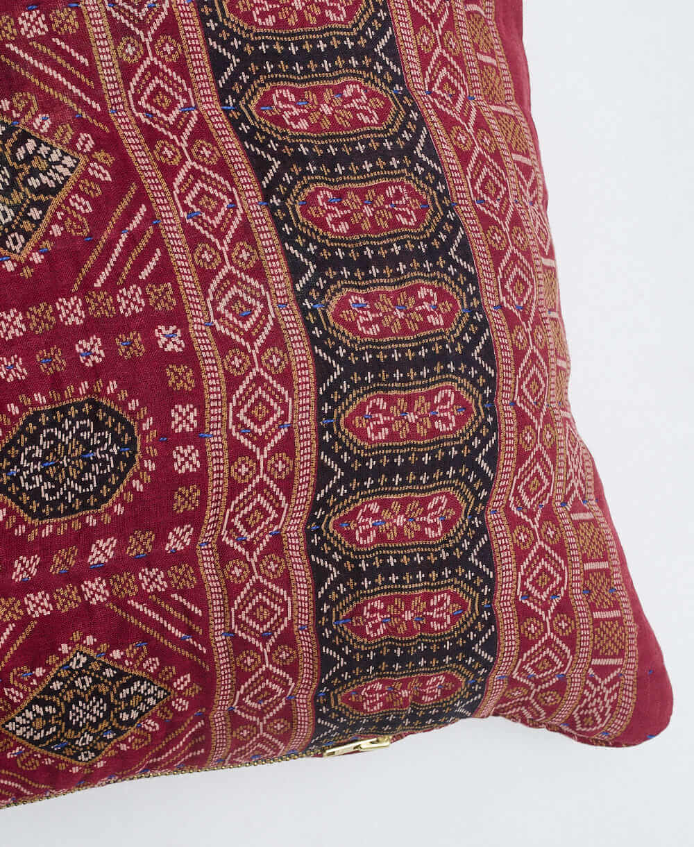 sustainable lumbar pillow in burgundy medallion print with blue kantha embroidery