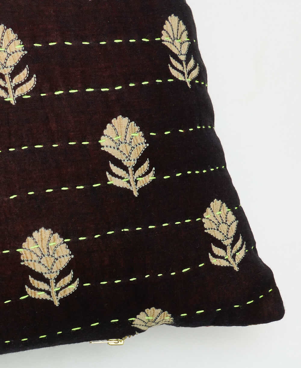 sustainable lumbar pillow in black & grey daisy print with neon green kantha embroidery