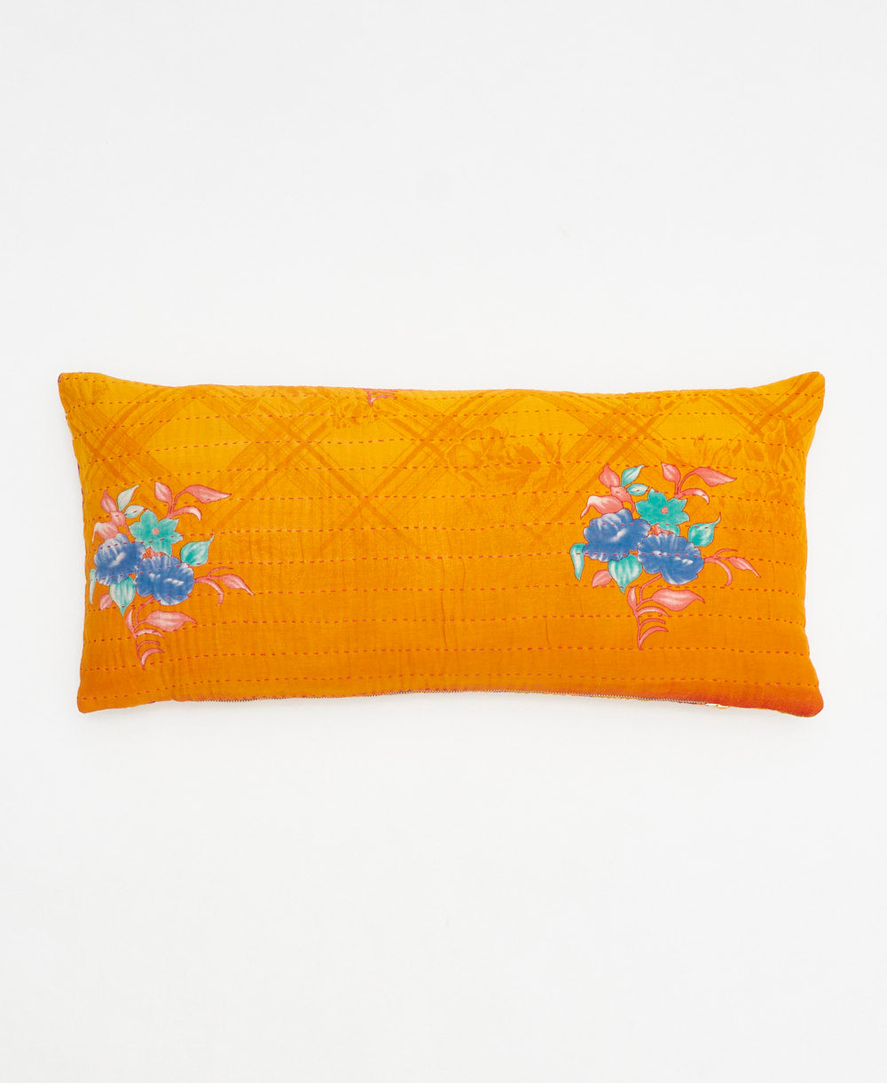 yellow-orange lumbar pillow with blue bouquet print made from upcycled vintage cotton saris in India