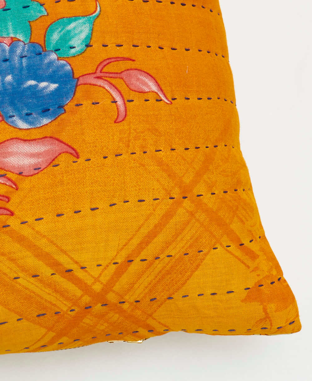 sustainable lumbar pillow in sunset orange & blue floral print with charcoal kantha embroidery