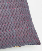 sustainable lumbar pillow in autumn purple floral print with hot pink kantha embroidery