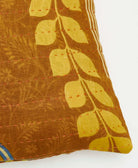 sustainable lumbar pillow in camel brown & yellow floral print with orange kantha embroidery