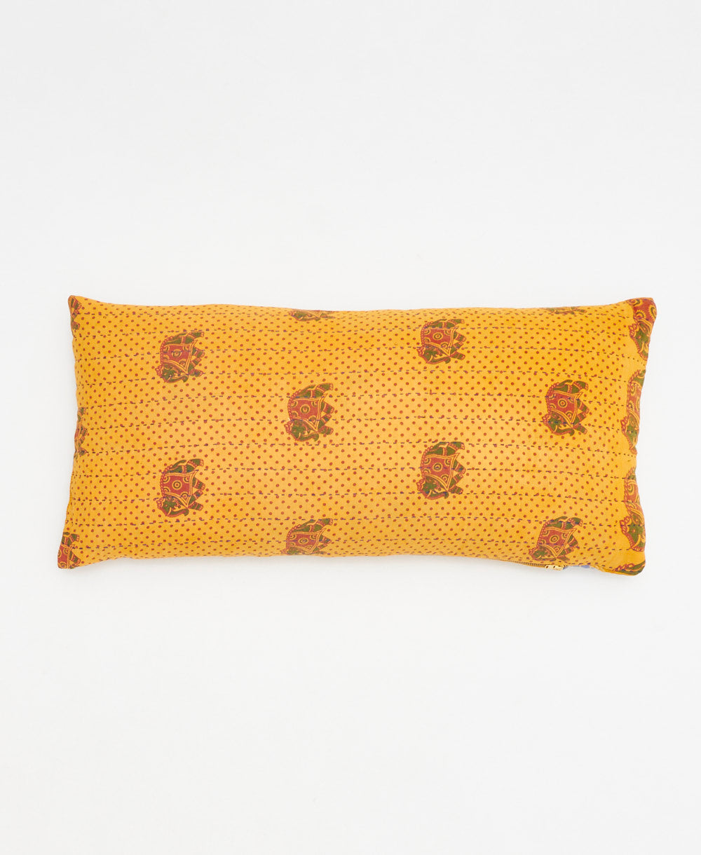 golden yellow lumbar pillow with an elephant print made from upcycled vintage cotton saris in India