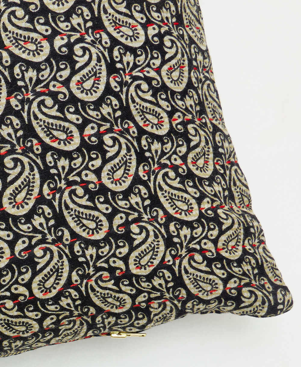 sustainable lumbar pillow in black & grey paisley print with red kantha embroidery