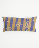 blue lumbar pillow with a tan floral stripe pattern