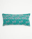 teal lumbar pillow with a lavender floral vine pattern
