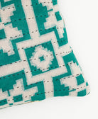 lumbar pillow in teal & white geometric print