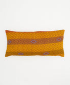 golden yellow lumbar pillow with orange stripe