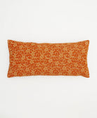 sunset orange lumbar throw pillow with beige florals