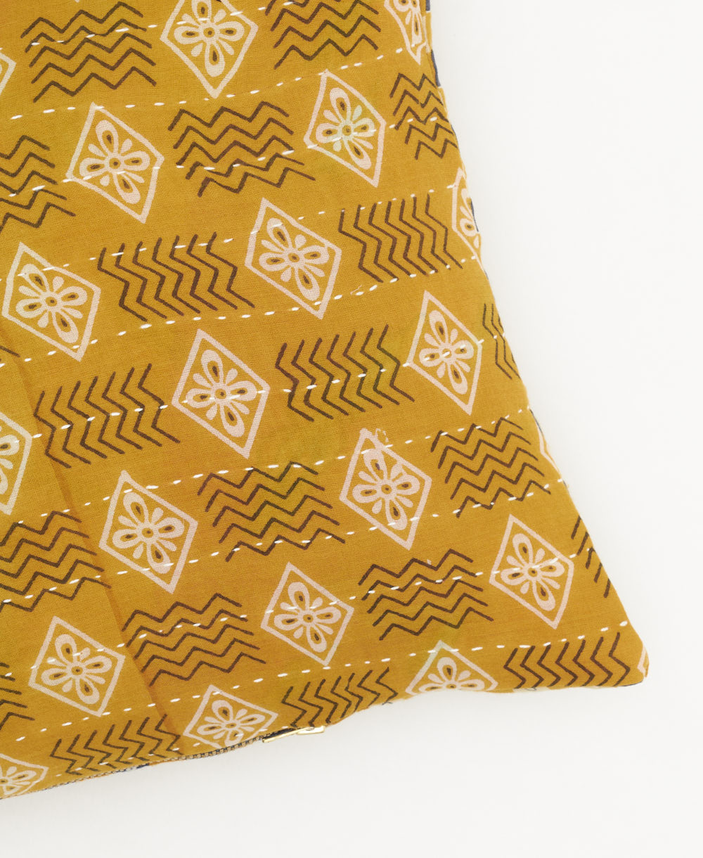 lumbar pillow in mustard yellow and white geometric diamond
