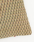 lumbar pillow in beige with tiny black flowers