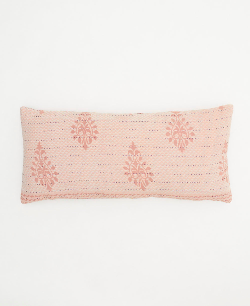 lumbar throw pillow in light baby pink with large oversized paisley print
