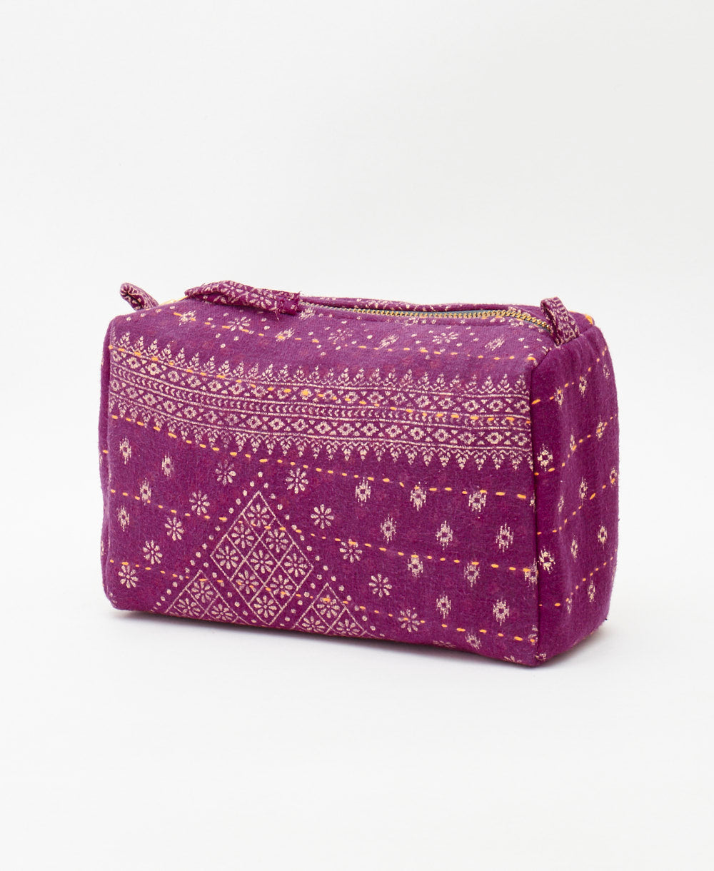 artisan made eco friendly cosmetic travel bag featuring orange traditional kantha hand stitching 