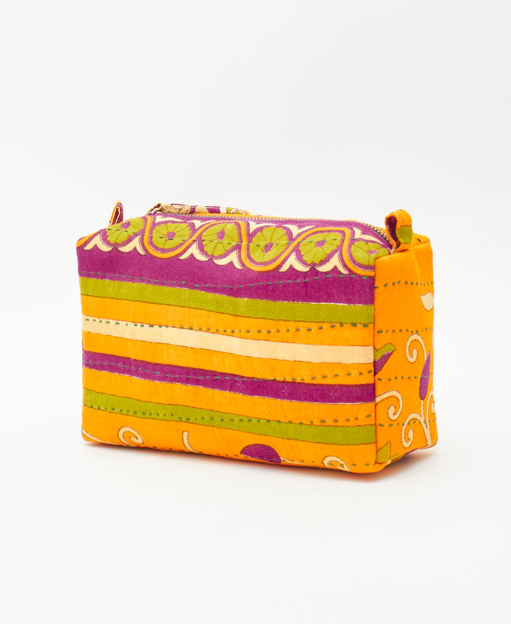 one-of-a-kind sunny yellow cosmetic travel bag hand made by artisans in India 