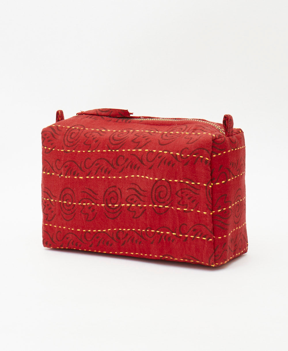 eco-friednly cosmetic travel bag made using repurposed red vintage cotton saris