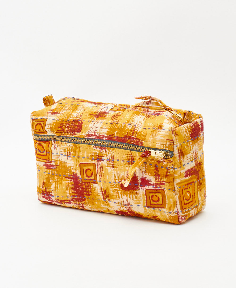 red and yellow geometric medium toiletry bag handmade by artisanas in India 