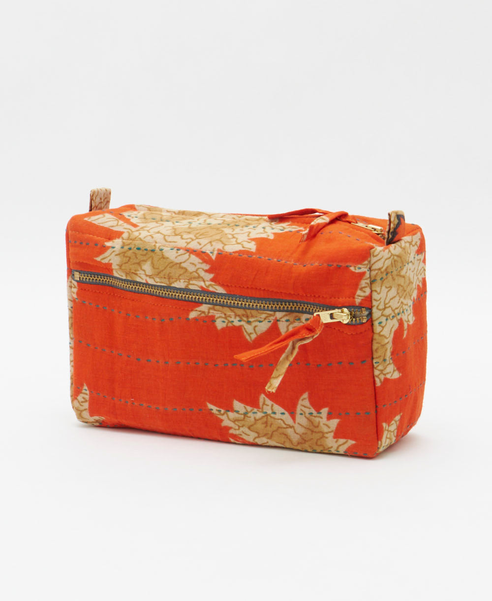 unique medium toiletry bag with tan & orange leaf print handmade in India from vintage cotton saris