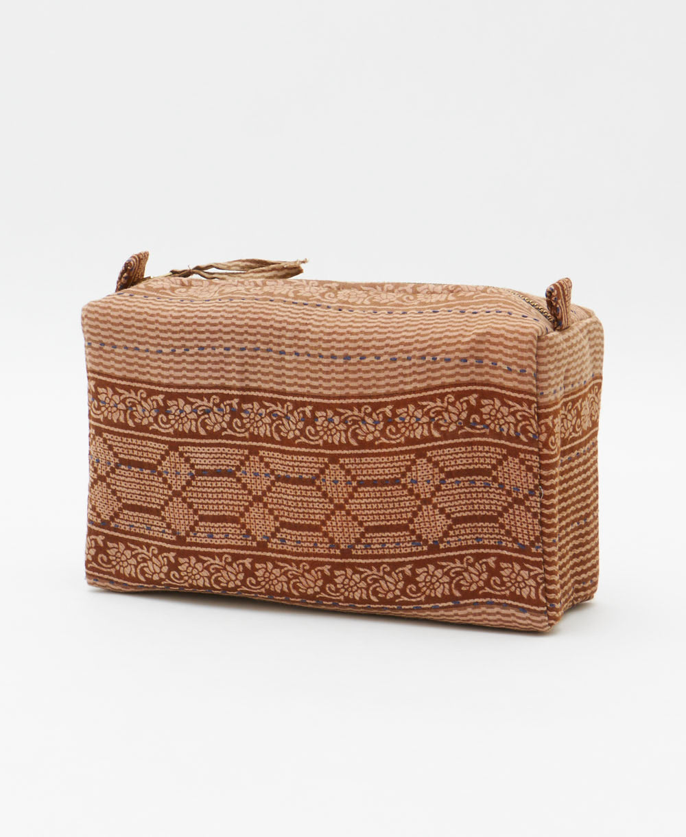 cosmetic travel bag in a brown & tan stripe print with black hand-stitched kantha embroidery